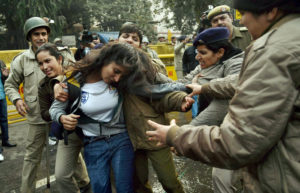 New Delhi: Police detain a girl student during a protest against the Ministry of Human Resource Development in New Delhi on Monday over the suicide of a PhD scholar Rohith Vemula at University of Hyderabad. PTI Photo by Atul Yadav  (PTI1_18_2016_000181B)